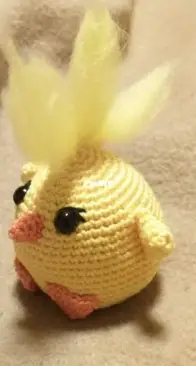 Yellow Chick with a mohawk hairstyle